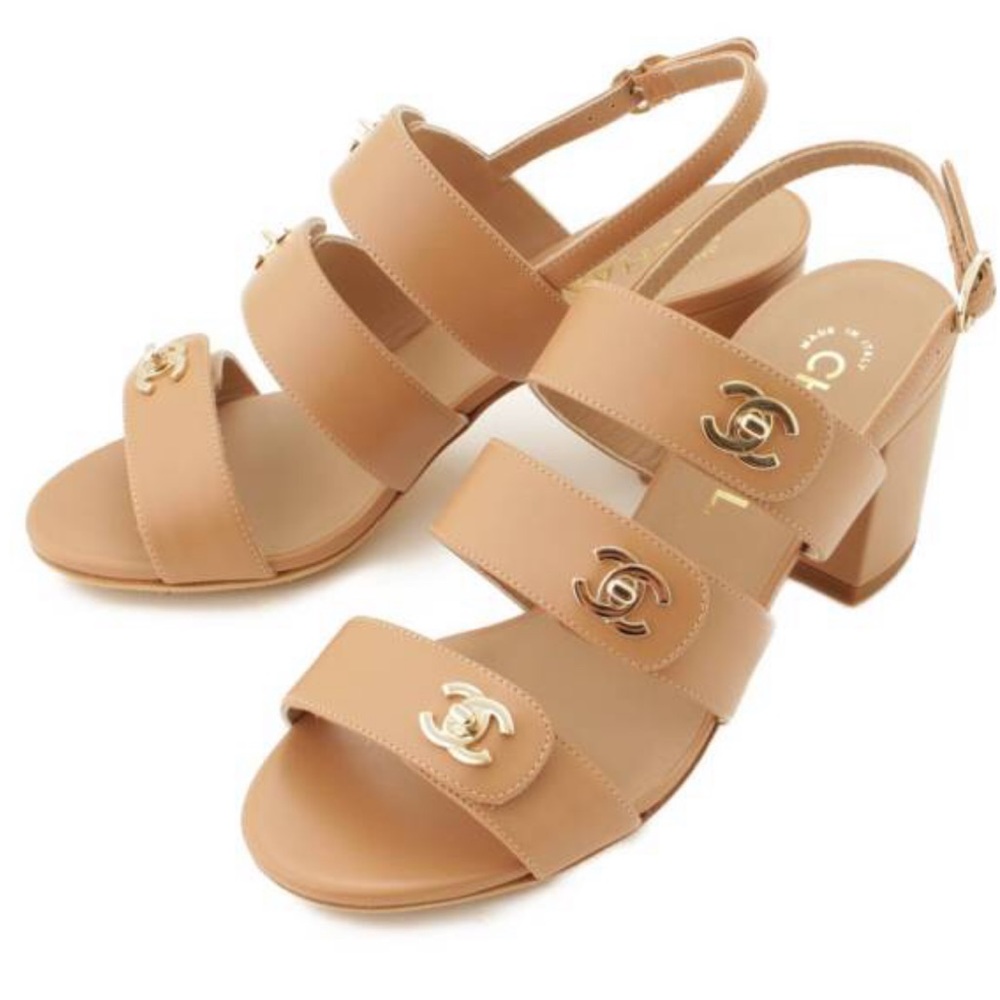 NWOB CHANEL Mark turnlock strap sandals. Size 42.